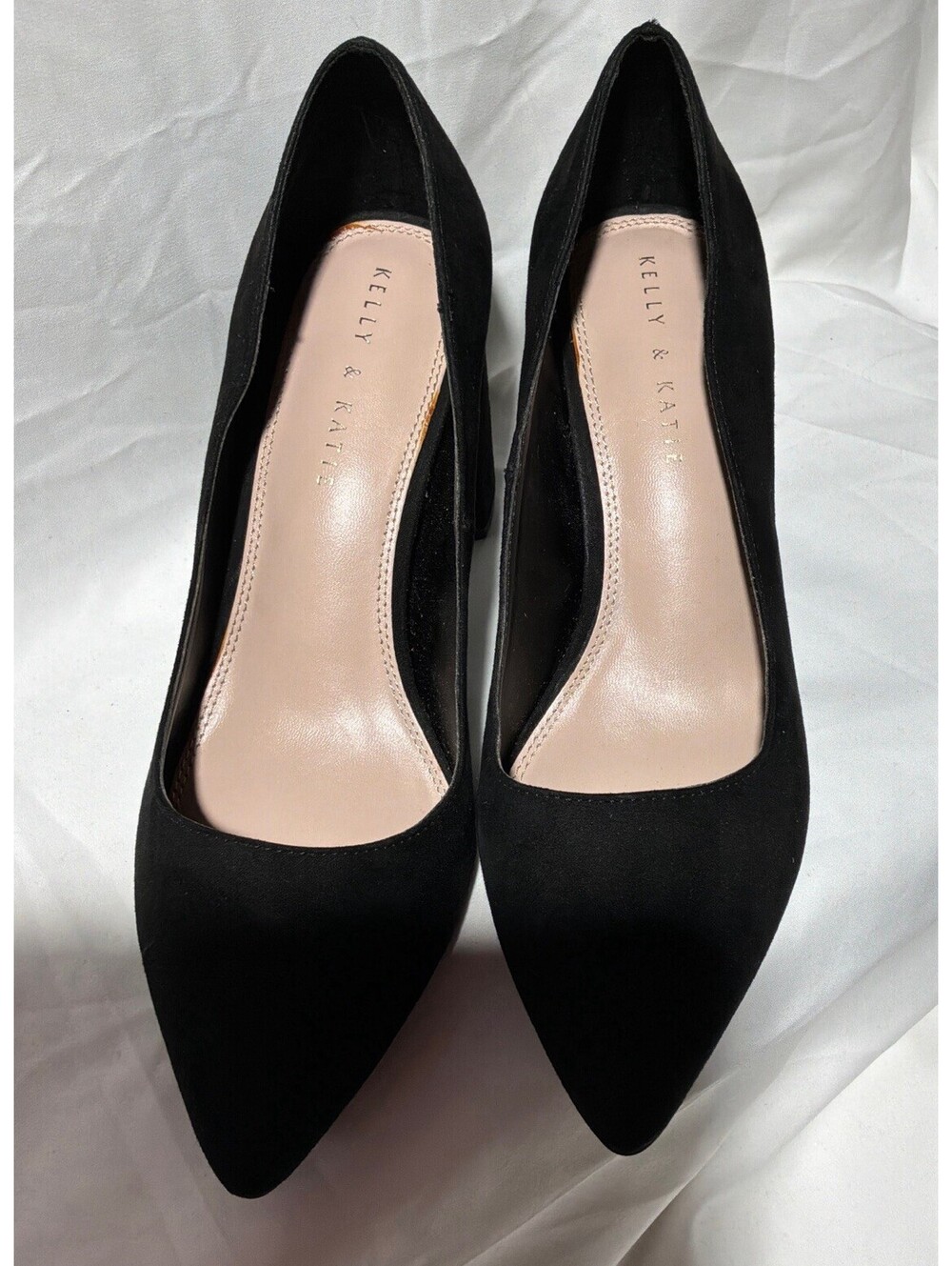 Black pointed-toe pumps by Kelly & Katie featuring a classic block heel.